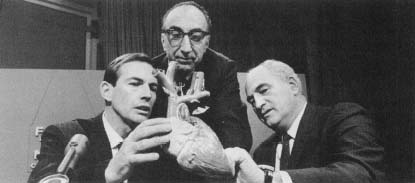 Christiaan Barnard (far left) discusses procedures with two other surgeons before appearing on the CBS television program Face the Nation.