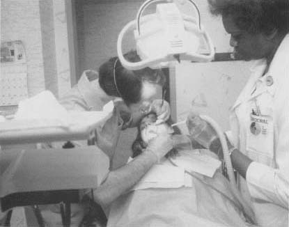 A patient has a tooth pulled. In the mid-184os Americans Horace Wells and W.T.G. Morton used the first general anesthesia for tooth extraction—a mixture of nitrous oxide, or "laughing gas," and ether.